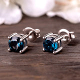Lynx London Blue Topaz Stud Earrings - Opulentsy